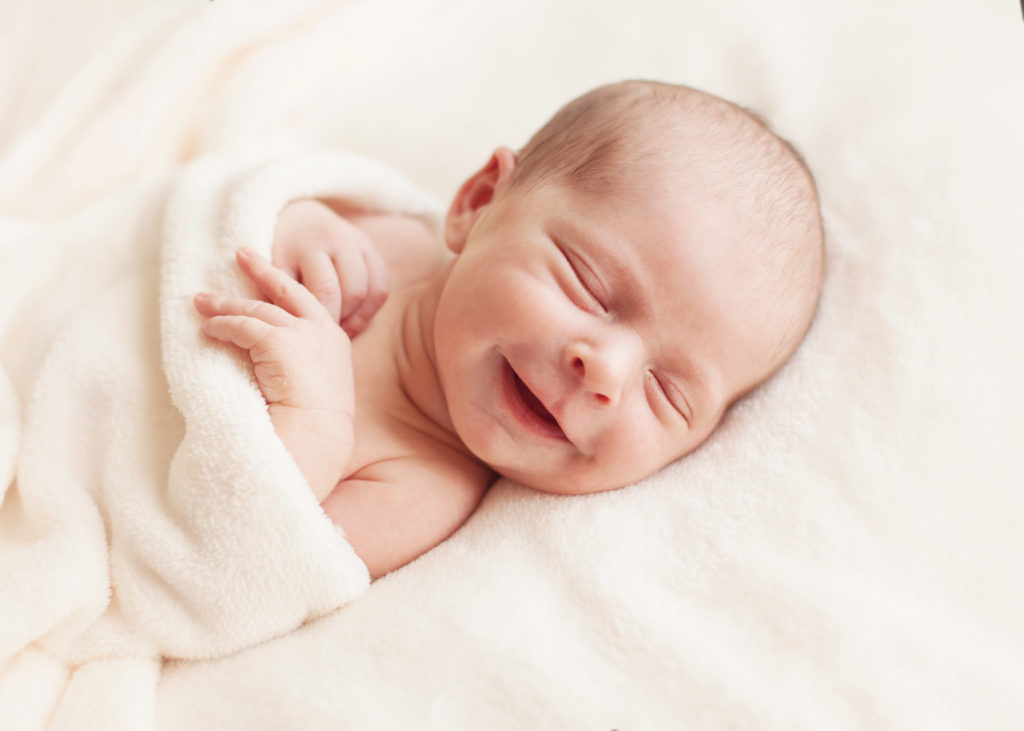 Image of a baby who might need frenectomy to help with nursing. 